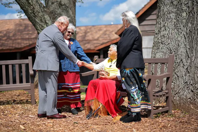 King Charles greets members of the Monacan Indian Nation