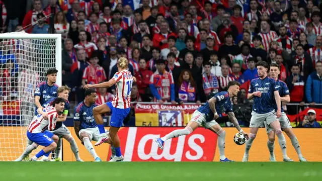 Ben White handles the ball