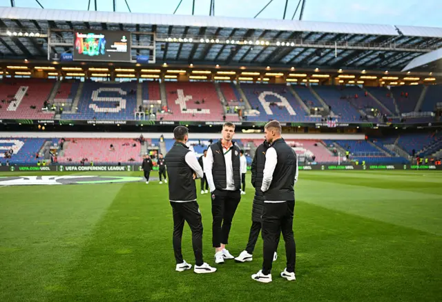 players check out pitch