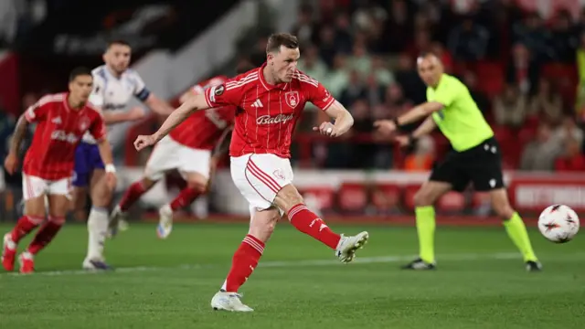 Chris Wood of Nottingham Forest scores his team's first goal from the penalty spot
