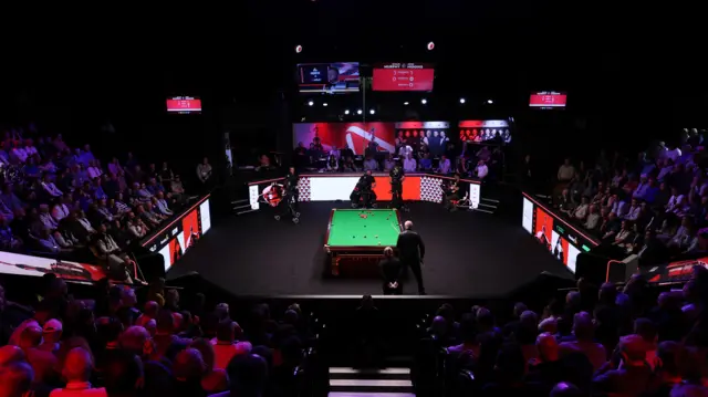 General view of the Crucible Theatre in Sheffield with snooker being played in the main arena