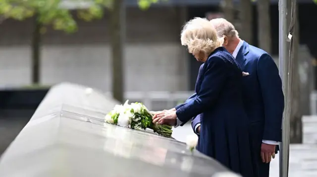 King Charles III and Queen Camilla are seen after laying a bouquet of flowers on the edge of one of the memorial’s pool during a ceremony at the National September 11 Memorial on day three of the State Visit of King Charles III and Queen Camilla to the United States of America, on April 29, 2026 in New York City