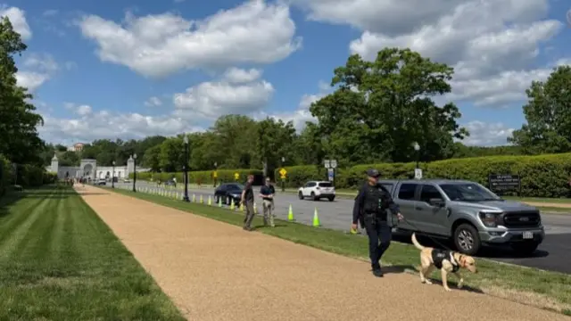 Secret service personnel conduct security checks before King and Queen's visit