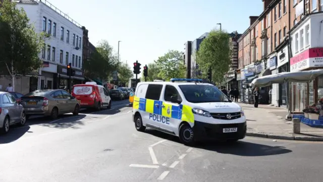 A police van in Golders Green earlier today