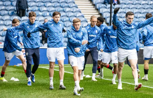 Rangers players warming up at Ibrox