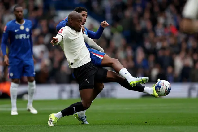 Wesley Fofana battles for possession with Port Vales' Martin Sherif