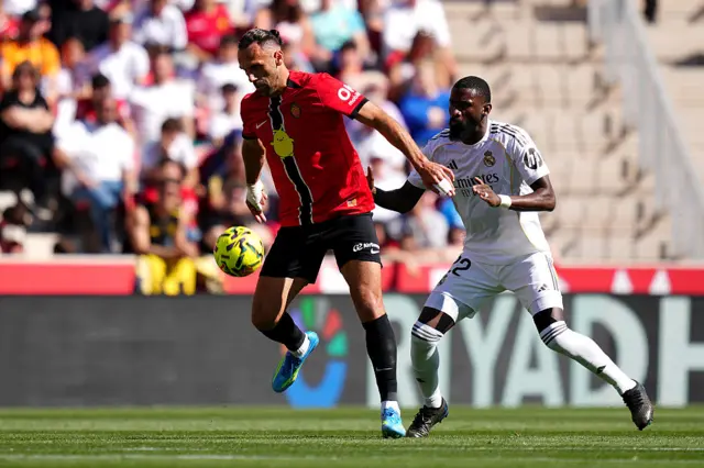 RCD Mallorca's Vedat Muriqi is challenged by Antonio Ruediger