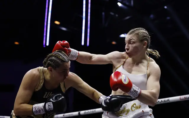 Stephanie Pineiro evades a punch from Lauren Price