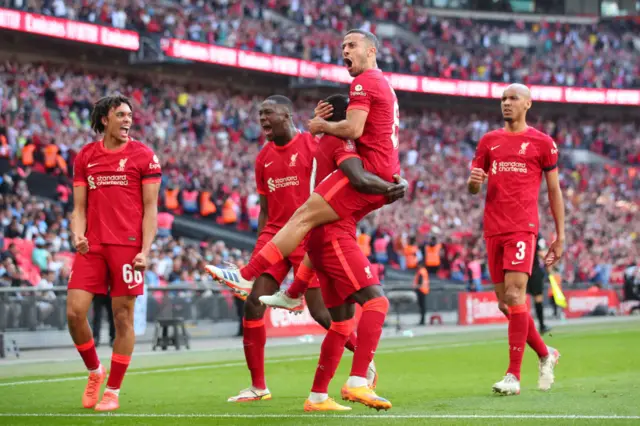 Liverpool players celebrate in the 2022 FA Cup semi-final
