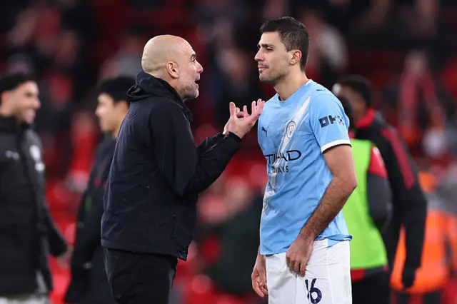Pep Guardiola and Rodri