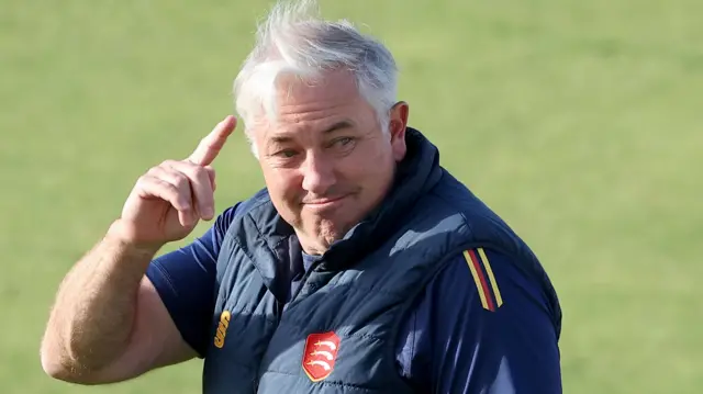 Essex director of cricket Chris Silverwood points to his head