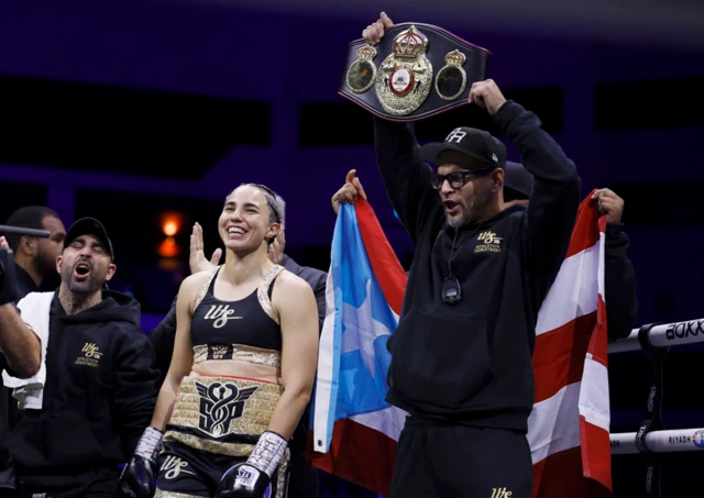 Stephanie Pineiro smiles in the ring