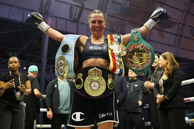 Ellie Scontey with all her belts