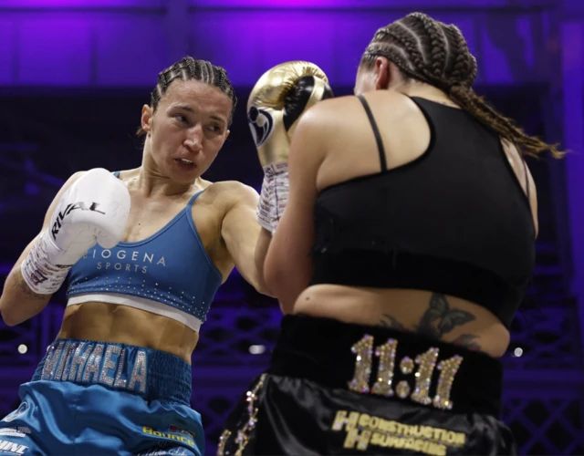 Kotaskova aims a punch at Chantelle Cameron