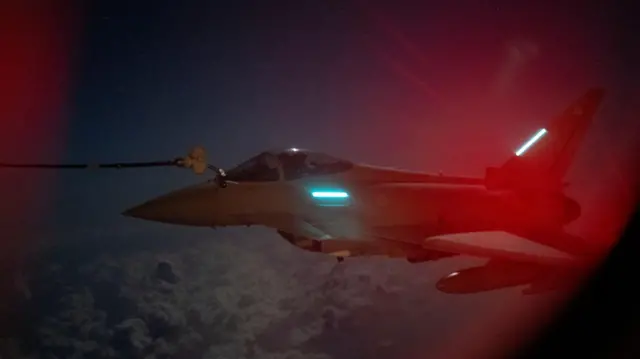 RAF Typhoon FGR4 refuels at night from a Voyager Air-to-Air Refuelling (AAR) aircraft over water between Cyprus and Israel. Picture date: Friday March 27, 2026.