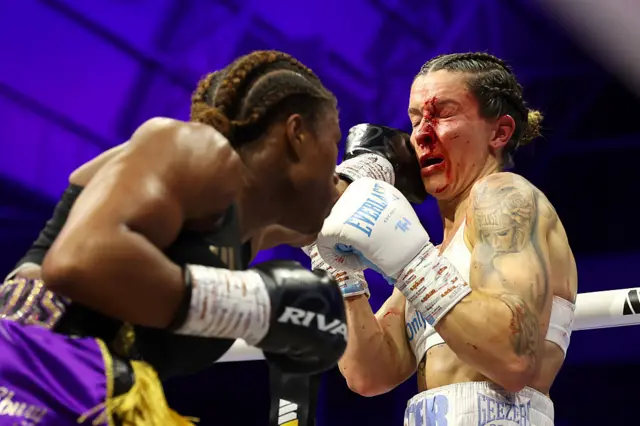 Caroline Dubois lands a punch on Terri Harper