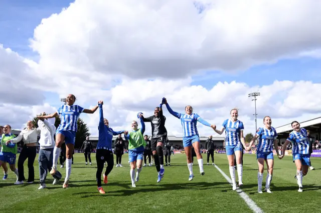 Brighton players celebrate