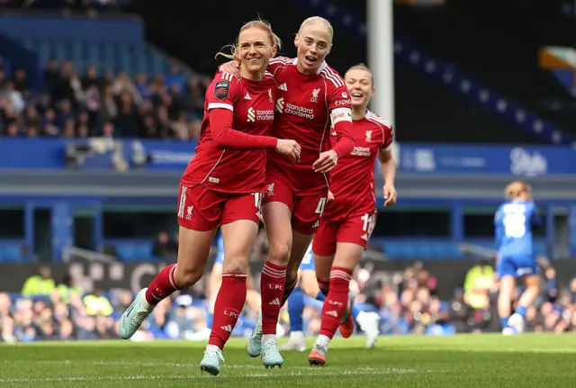 Ceri Holland of Liverpool celebrates scoring her team's first goal
