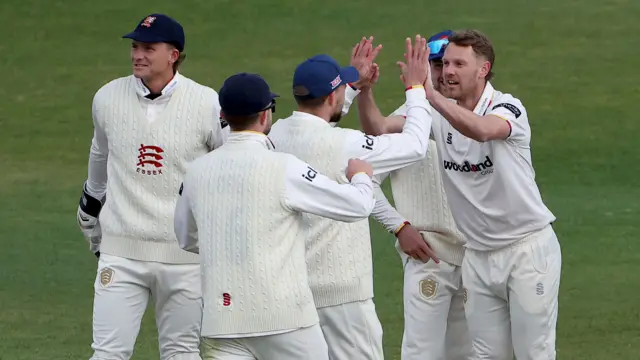 Jamie Porter takes a wicket