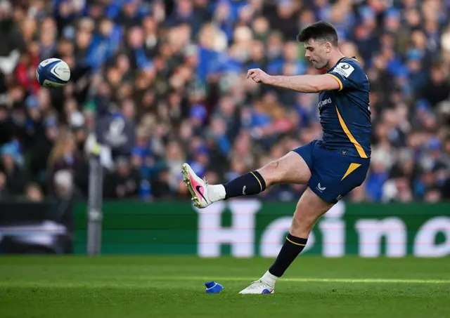 Harry Byrne kicks a conversiob