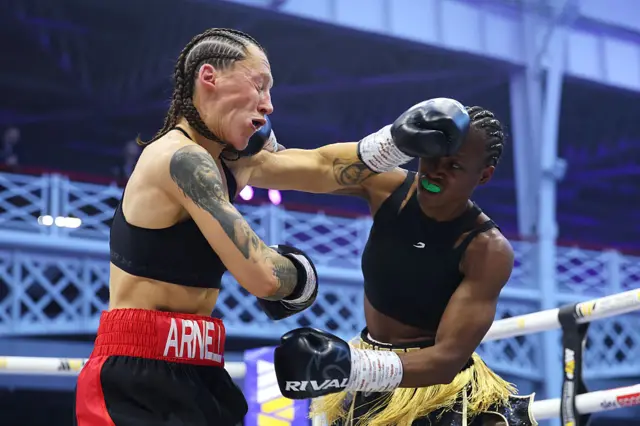 Elizabeth Oshoba punches Chelsey Arnell