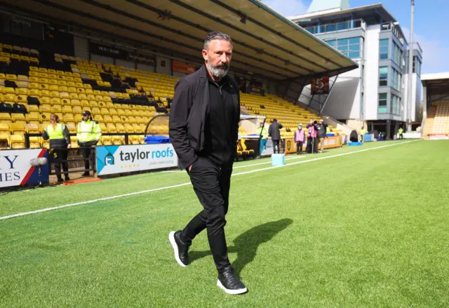 Hearts head coach Derek McInnes steps out on to the Livingston pitch