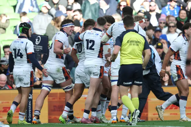 Ross Thompson celebrates scoring a try
