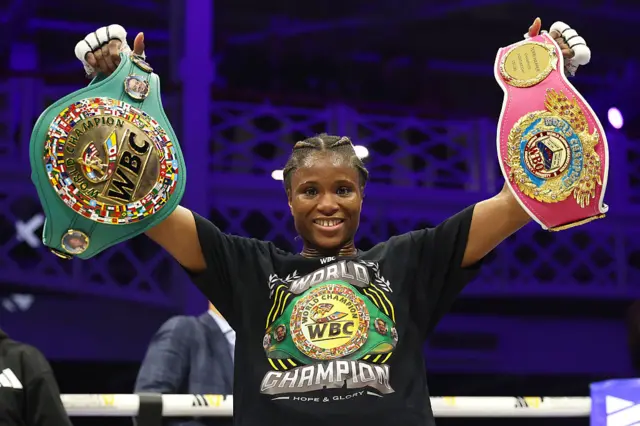 Caroline Dubois with her WBC and WBO world titles