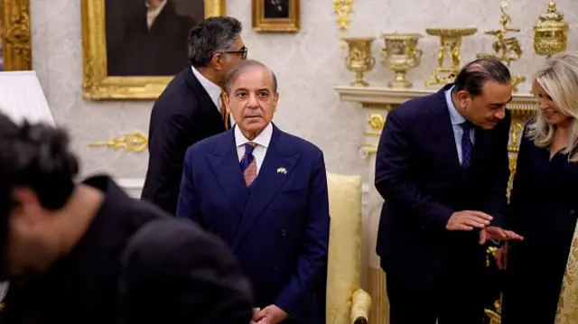 Asim Munir stands in the Oval Office