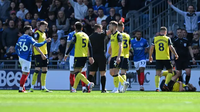 Connor Ogilvie shown a red card