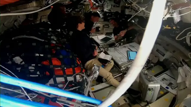 Astronauts inside the Orion spacecraft