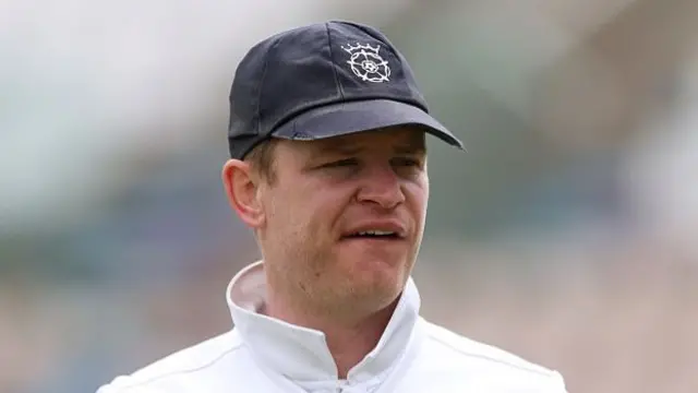 Ben Brown looks pensive under a blue cap