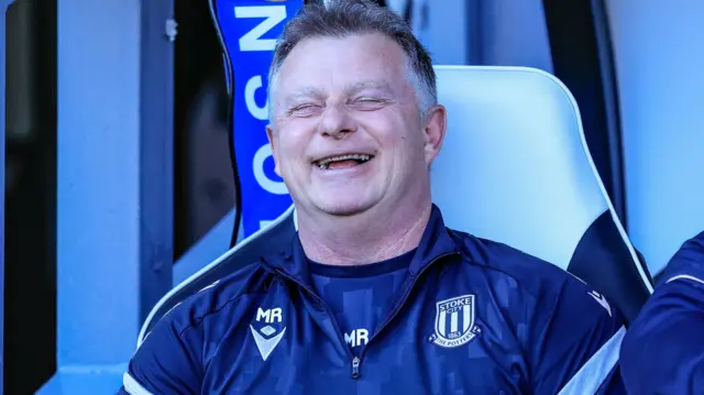 Mark Robins smiles