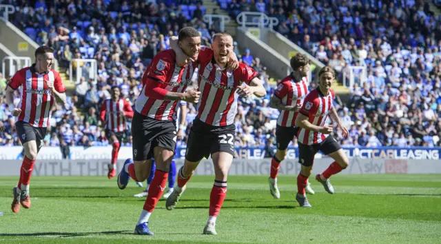 Ryan One celebrates scoring for Lincoln