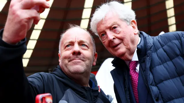 Roy Hodgson having a selfie with a fan