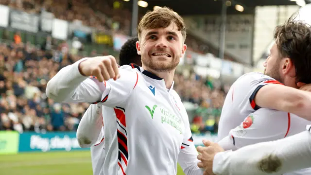 Bolton's Max Conway celebrates with his fist pumped after scoring against Plymouth