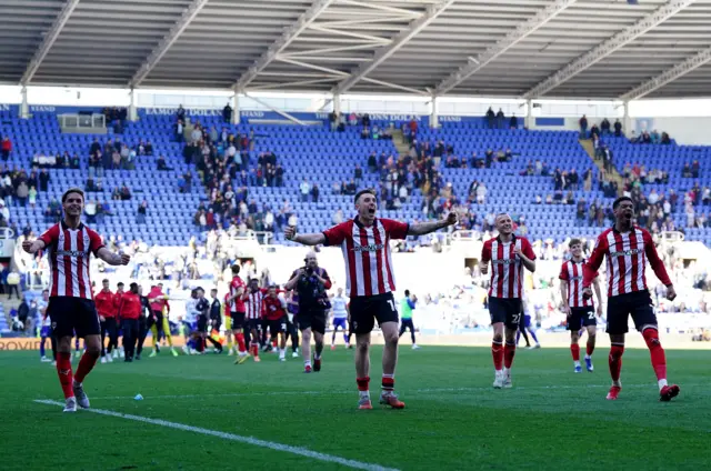 Lincoln players celebrate at full-time