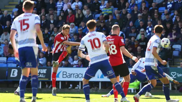 Ryley Towler of Lincoln City with a shot on goal