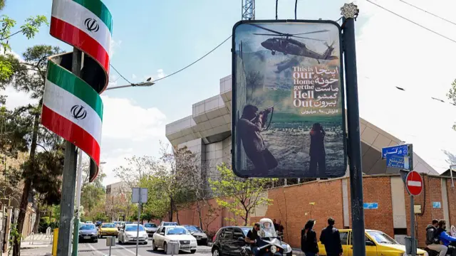 A poster in Tehran on Monday morning, reading (in English): "This is our home, get the hell out"