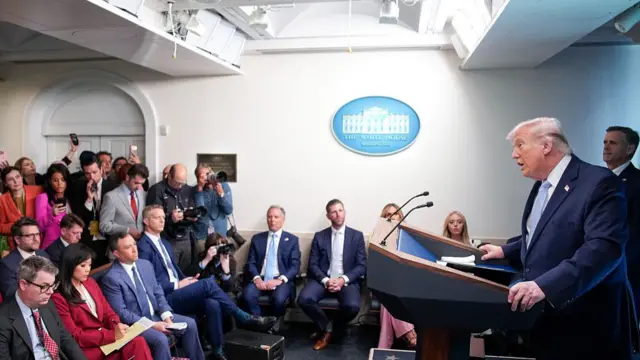 Donald Trump answers questions in the White House briefing room