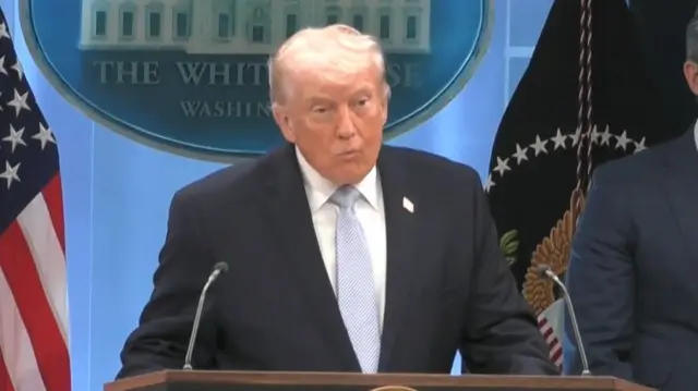 Donald Trump speaks at the White House