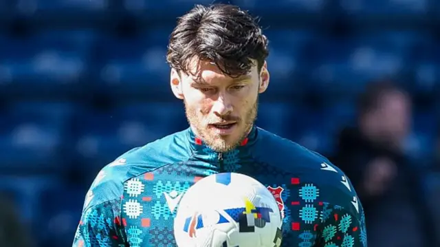 Kieffer Moore warms up
