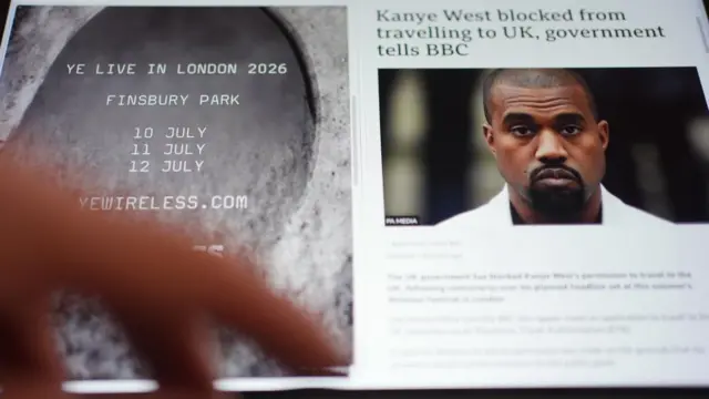 A laptop screen displays the announcement that Kanye West would play three nights in Finsbury Park. On the other half of the screen it shows a BBC news article saying West has been blocked from travelling to the UK