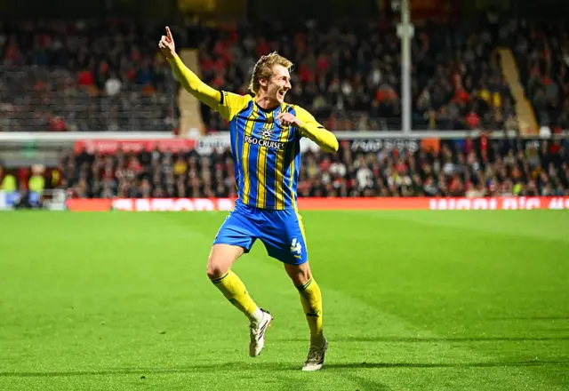 Flynn Downes celebrates