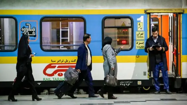A brightly coloured train in Tehran