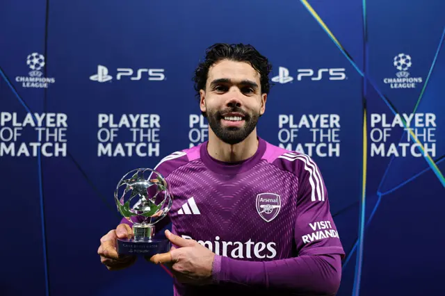 David Raya of Arsenal poses for a photo with the PlayStation Player Of The Match award