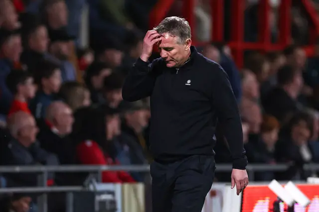 Phil Parkinson looks dejected