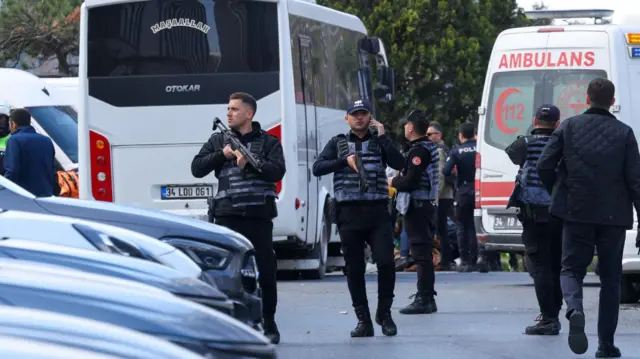 Police work at the scene, after gunfire was heard near the building housing the Israeli consulate, according to a witness, in Istanbul, Turkey