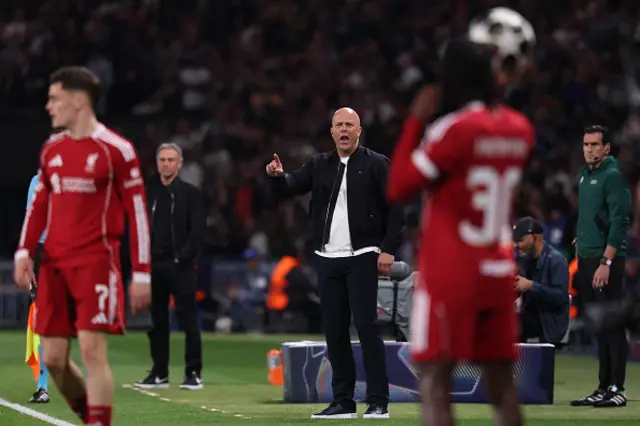 Arne Slot reacts from the touch line