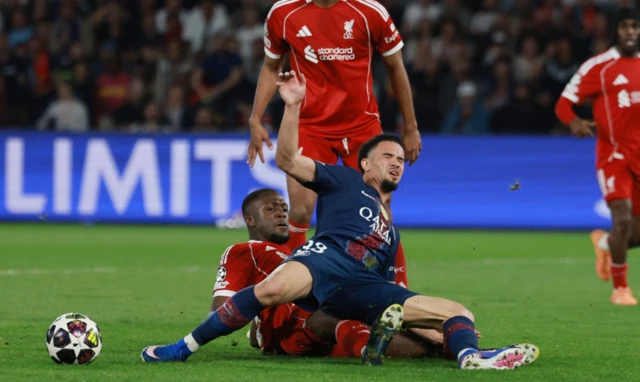 Liverpool's Ibrahima Konate fouls Paris St Germain's Warren Zaire-Emery to concede a penalty